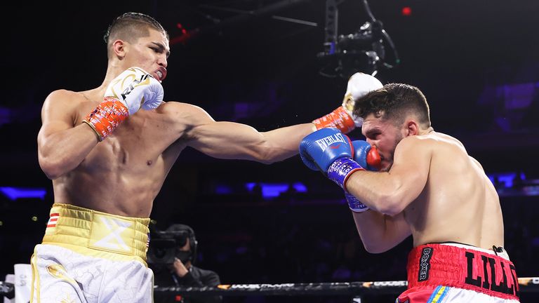 NEW YORK, NEW YORK - DECEMBER 11: Xander Zayas (L) and Alessio Mastronunzio (R) exchange punches during their jr. middleweight fight at Madison Square Garden on December 11, 2021 in New York City. (Photo by Mikey Williams/Top Rank Inc via Getty Images)