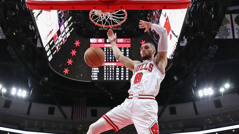 Zach LaVine #8 of the Chicago Bulls dunks against the Atlanta Hawks at the United Center on December 29, 2021 in Chicago, Illinois.  Bulls defeated Hawks 131-117