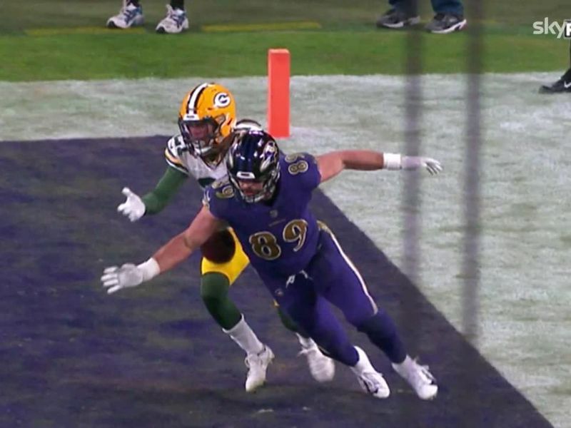 BALTIMORE, MD - DECEMBER 19: The Packers offense celebrates in a huddle  after a touchdown during the Green Bay Packers versus Baltimore Ravens NFL  game at M&T Bank Stadium on December 19