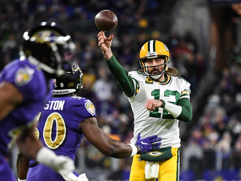 BALTIMORE, MD - DECEMBER 19: Packers quarterback Aaron Rodgers (12) looks  up at the scoreboard during the Green Bay Packers versus Baltimore Ravens  NFL game at M&T Bank Stadium on December 19