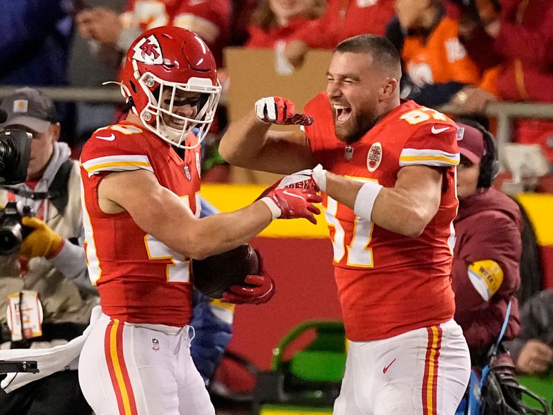 Kansas City Chiefs quarterback Patrick Mahomes (15) waves to fans after the  team's win against the Denver Broncos during an NFL football game Saturday,  Jan. 8, 2022, in Denver. (AP Photo/Jack Dempsey