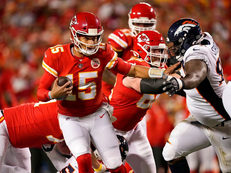 Kansas City Chiefs quarterback Patrick Mahomes (15) plays against the  Denver Broncos of an NFL football game Sunday, December 11, 2022, in  Denver. (AP Photo/Bart Young Stock Photo - Alamy