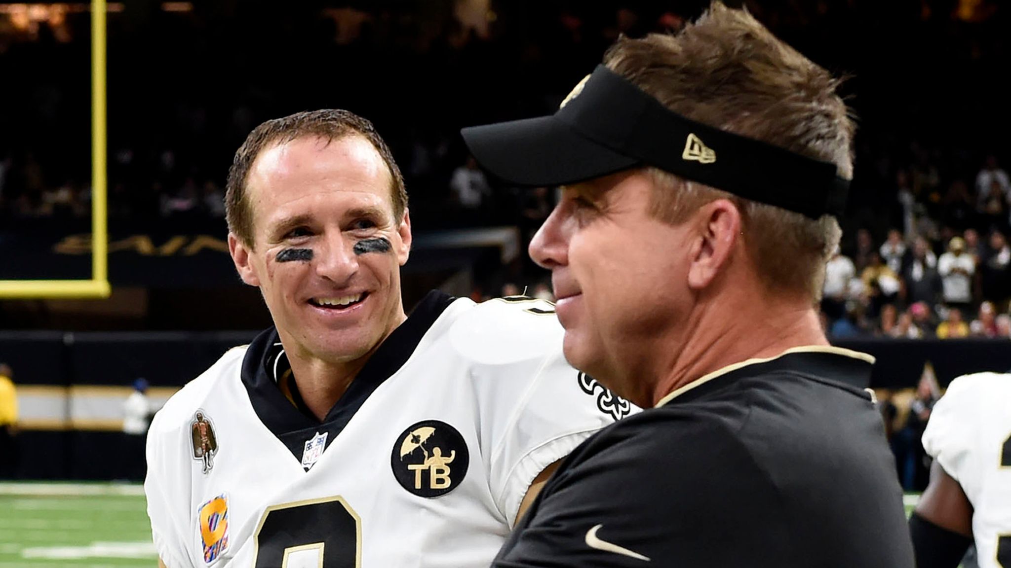 Head coach Sean Payton of the New Orleans Saints shows off his