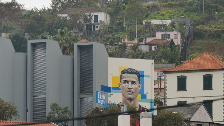 A general view of a part of Santo Antonio (English: Saint Anthony) with Cristiano Ronaldo mural 'Son of the Land' seen on  a shopping center wall..Portuguese football star Cristiano Ronaldo grew up here and played for amateur team Andorinha from 1992 to 1995..On Thursday, April 26, 2018, in Funchal, Madeira Island, Portugal. (Photo by Artur Widak/NurPhoto)
