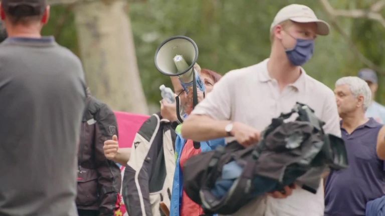 Novak Djokovic supporters gather outside the Melbourne hotel where he is being detained