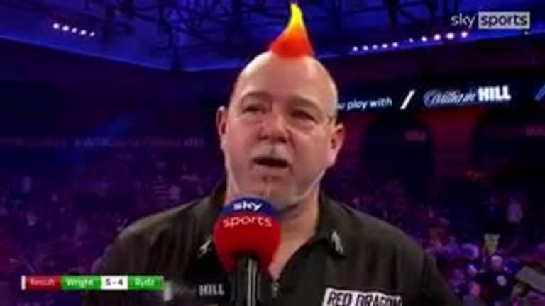 An emotional Wright set up a semi-final encounter with two-time champion Anderson after battling his way through an epic