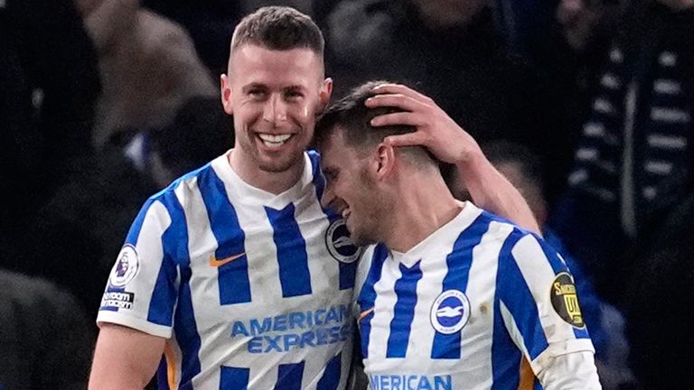 Adam Webster celebrates his headed equaliser with team-mate Pascal Gross