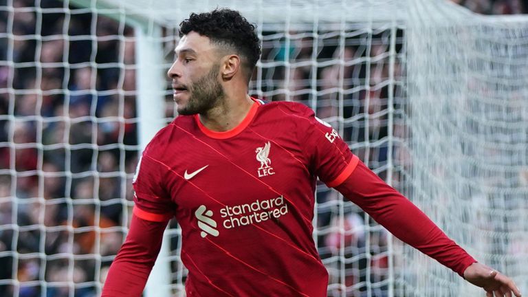 Alex Oxlade-Chamberlain celebrates after scoring in front of The Kop - AP Photo-Jon Super