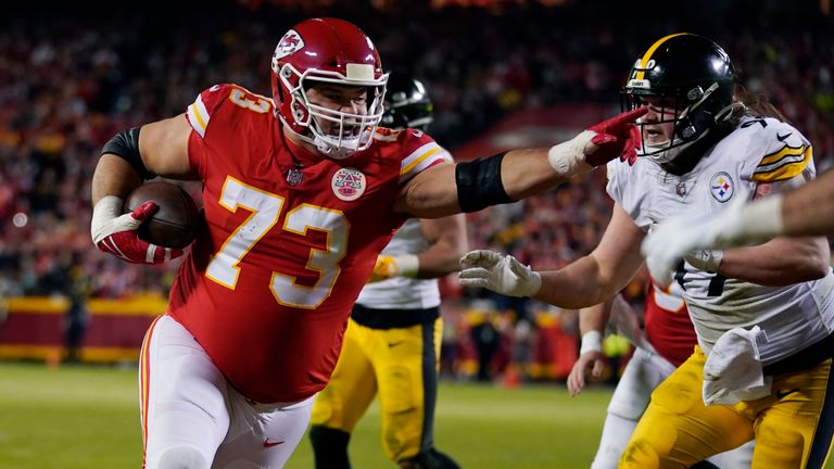 Kansas City Chiefs guard Nick Allegretti scores on a 1-yard touchdown reception during the second half of an NFL wild-card playoff football game against the Pittsburgh Steelers
