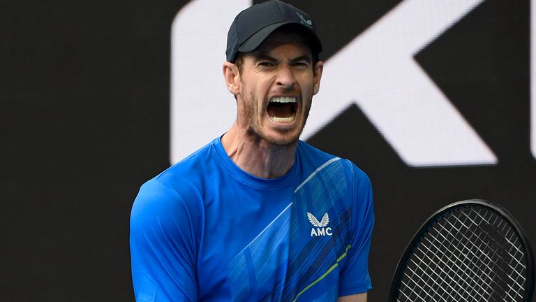 Andy Murray of Britain reacts after winning a point against Nikoloz Basilashvili of Georgia  during their first round match at the Australian Open tennis championships in Melbourne, Australia, Tuesday, Jan. 18, 2022. (AP Photo/Andy Brownbill)