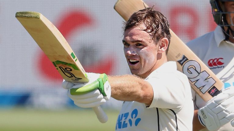 AP - Tom Latham of New Zealand celebrates his 200 runs during play on day two of the second Test between Bangladesh and New Zealand at Hagley Oval in Christchurch, New Zealand, Monnday, Jan. 10, 2022. (Martin Hunter/Photosport via AP)