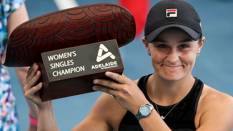 Ash Barty lifts the winner's trophy at the Adelaide International (AP)