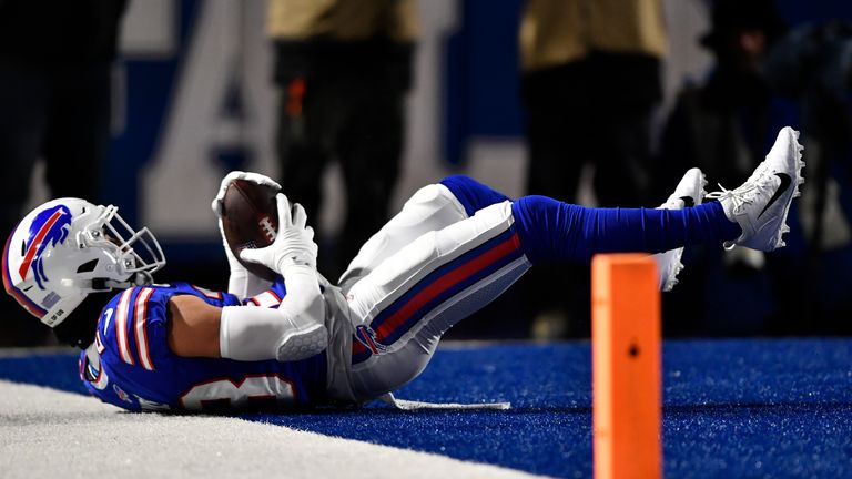 Buffalo Bills safety Micah Hyde catches an interception during the first half of an NFL wild-card playoff football game against the New England Patriots, Saturday, Jan. 15, 2022, in Orchard Park, N.Y. 