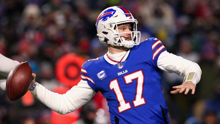 Buffalo Bills quarterback Josh Allen passes during the first half of an NFL wild-card playoff football game against the New England Patriots, Saturday, Jan. 15, 2022, in Orchard Park, N.Y.