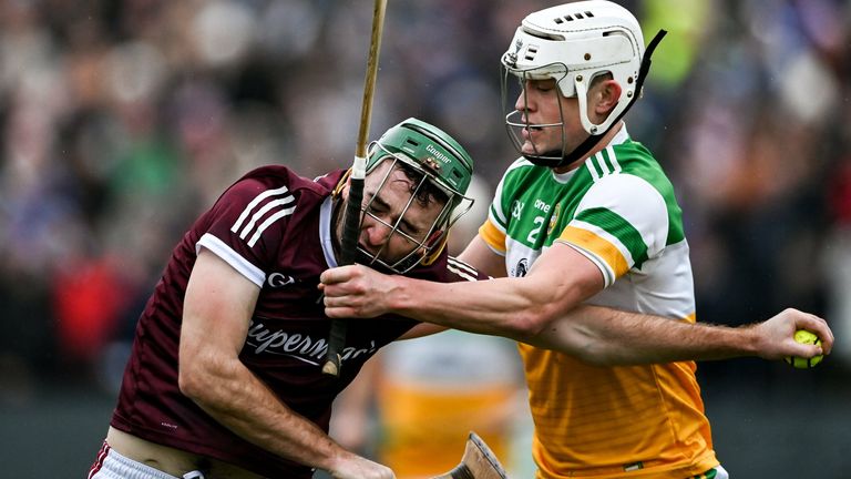 Brian Concannon of Galway in action against Joey Keenaghan of Offaly