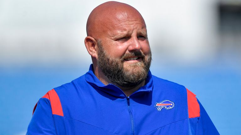 Buffalo Bills offensive coordinator Brian Daboll walks on the field before a preseason NFL football game against the Green Bay Packers in Orchard Park, N.Y., Saturday, Aug. 28, 2021. (AP Photo/Adrian Kraus)