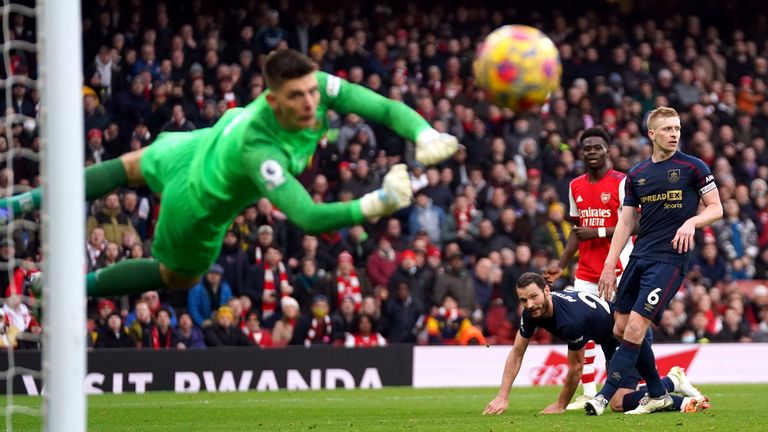 Bukayo Saka sees his shot saved by Nick Pope