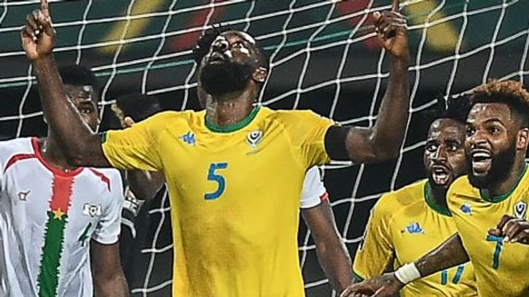 Gabon's defender Bruno Ecuele Manga (C) celebrates after scoring his team's first goal during the Africa Cup of Nations (CAN) 2021 round of 16 football match between Burkina Faso and Gabon at Limbe Omnisport Stadium in Limbe on January 23, 2022. 