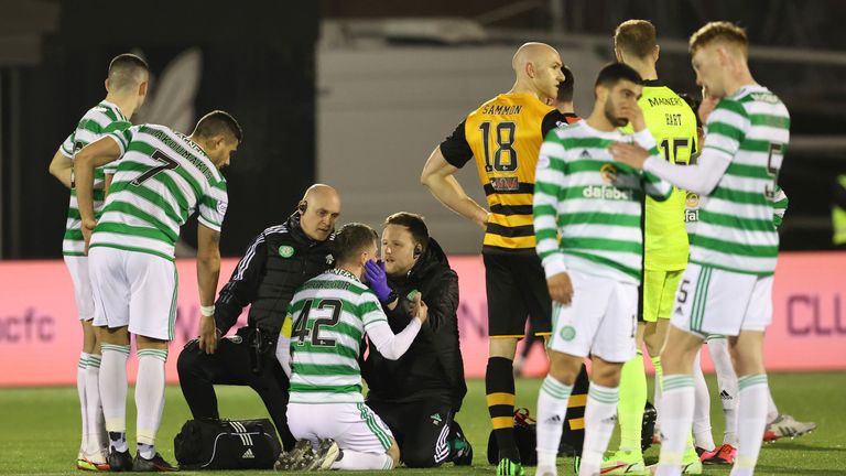 ALLOA, SCOTLAND - JANUARY 22: Celtic's Callum McGregor goes down injured during the Scottish Cup 4th round match between..Alloa Athletic and Celtic at the Indodrill Stadium, on January 22, 2022, in Alloa, Scotland.  (Photo by Alan Harvey / SNS Group)