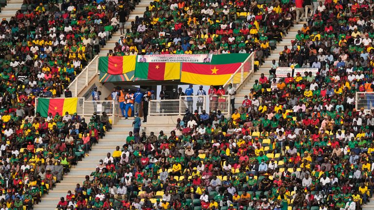 Soccer fans watch the African Cup of Nations 2022 group A soccer match between Cape Verde and Cameron at the Olembe stadium in Yaounde, Cameroon, Monday, Jan. 17, 2022. 