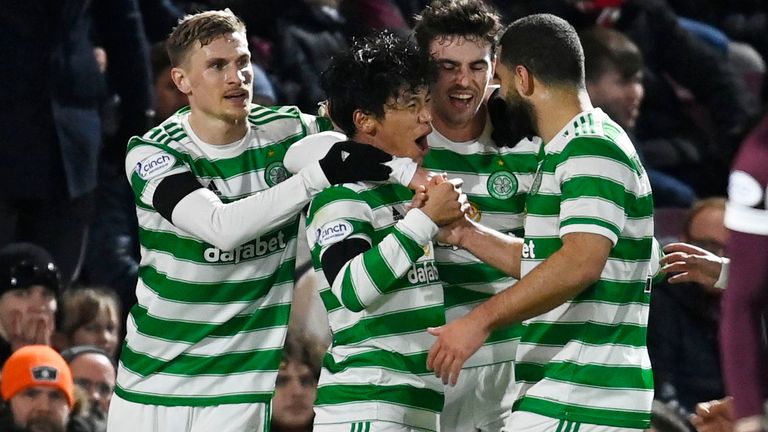 EDINBURGH, SCOTLAND - JANUARY 26: Celtic&#39;s Reo Hatate (left) celebrates with teammater after he makes it 1-0, beating Hearts&#39; Craig Gordon during a cinch Premiership match between Hearts and Celtic at Tynecastle Park , on January 26, 2022, in Edinburgh, Scotland. (Photo by Rob Casey / SNS Group)