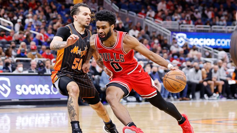 Chicago Bulls guard Coby White drives against Orlando Magic guard Cole Anthony