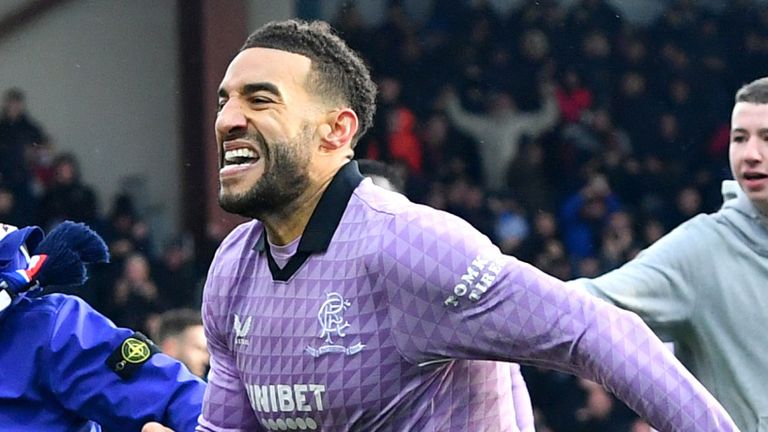 Connor Goldson celebrates scoring Rangers' third goal at Ross County