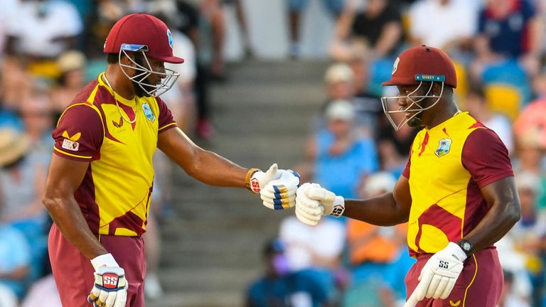 West Indies' Rovman Powell (L) and Kieron Pollard put together an unbroken fifth-wicket stand of 74 to lift their side to 179-4
