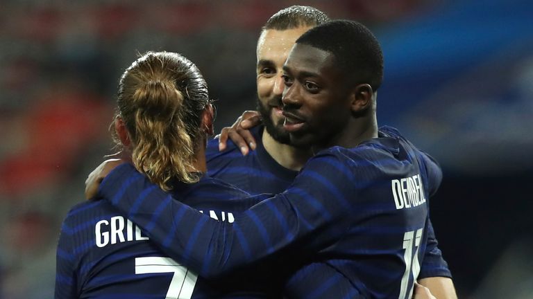 France's Ousmane Dembele, right, celebrates with France's Antoine Griezmann after scoring his side's third goal during the international friendly soccer match between France and Wales at the Allianz Riviera stadium in Nice, France, Wednesday, June 2, 2021. (AP Photo/Daniel Cole)