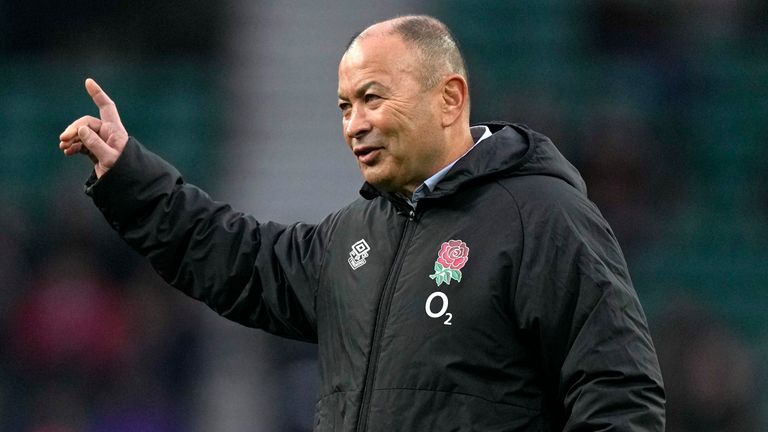 England's Head Coach Eddie Jones gestures as he watches his players warm-up before an international rugby union match between England and South Africa at Twickenham Stadium, London, Saturday, Nov. 20, 2021. (AP Photo/Alastair Grant)