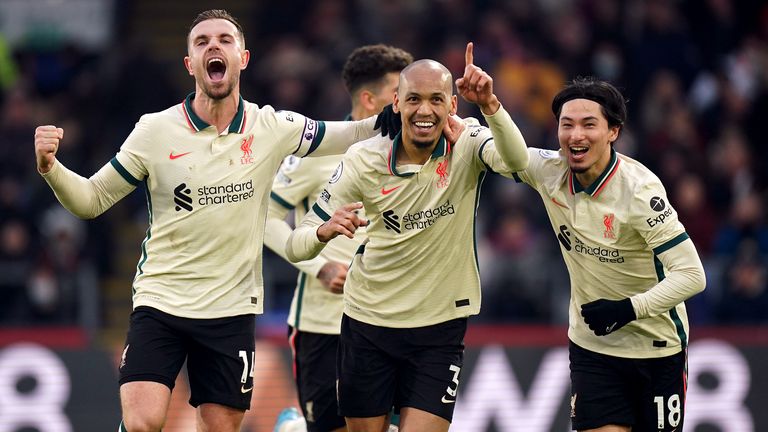 Fabinho and teammates celebrate Liverpool's third goal