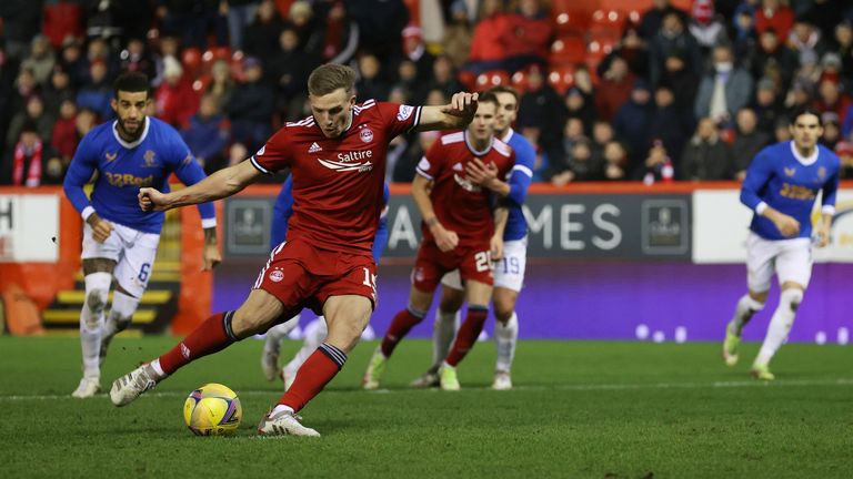 ABERDEEN, SCOTLAND - JANAURY 18: The ball appears to move slightly as Lewis Ferguson scores for Aberdeen from the penalty spot, making it 1-1 during a Cinch Premiership match between Aberdeen and Rangers at Pittodrie, on January 18, 2022, in Aberdeen, Scotland. (Photo by Craig Williamson / SNS Group)