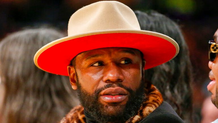 Boxer Floyd Mayweather attends an NBA basketball game between the Memphis Grizzlies and the Los Angeles Lakers in Los Angeles, Sunday, Oct. 24, 2021. (AP Photo/Ringo H.W. Chiu)