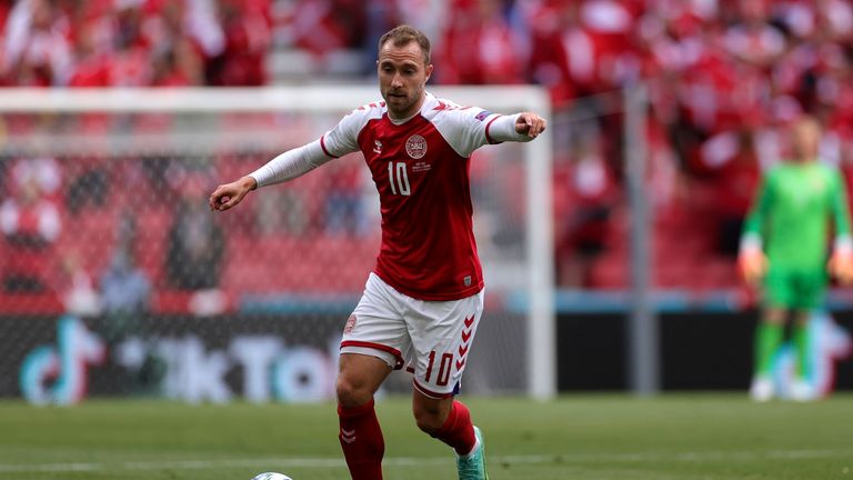 FILE - Denmark&#39;s Christian Eriksen controls the ball during the Euro 2020 soccer championship group B match between Denmark and Finland at Parken stadium in Copenhagen, June 12, 2021. Eriksen has resumed training in Denmark as part of his rehabilitation after suffering a cardiac arrest at the European Championship.