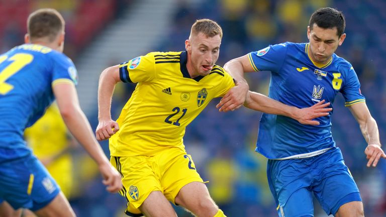 Sweden&#39;s Dejan Kulusevski (centre) and Ukraine&#39;s Taras Stepanenko battle for the ball during the UEFA Euro 2020 round of 16 match at Hampden Park, Glasgow.