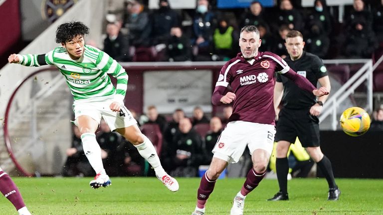 Celtic's Reo Hatate shoots towards goal during the cinch Premiership match at Tynecastle Park, Edinburgh. 