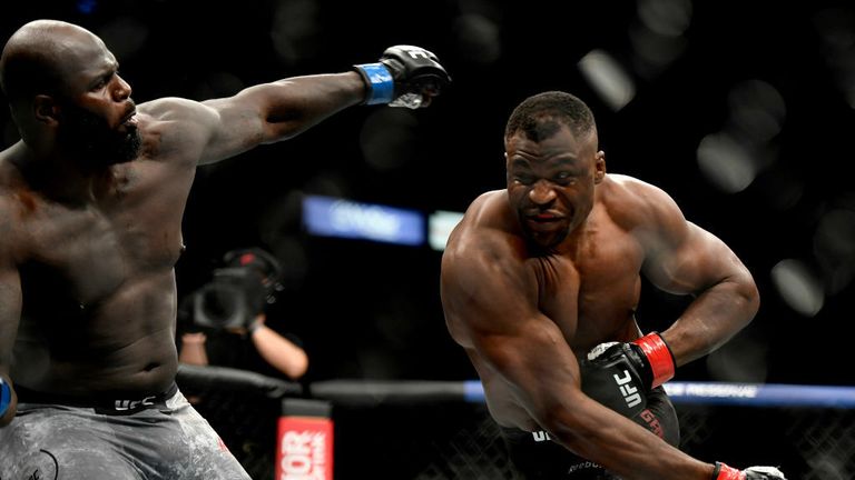 (R) of Cameroon misses a punch against Jair Rozenstruik of Suriname in their Heavyweight fight during UFC 249 at VyStar Veterans Memorial Arena on May 09, 2020 in Jacksonville, Florida. (Photo by Douglas P. DeFelice/Getty Images)