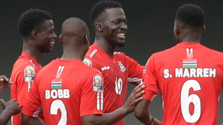 Gambia's players celebrate after teammate Musa Barrow scored equaliser against Mali in AFCON Group F game (AP)