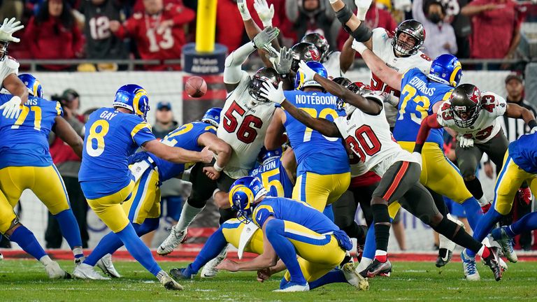 Los Angeles Rams&#39; Matt Gay (8) kicks a game-winning field goal against the Tampa Bay Buccaneers during the second half of an NFL divisional round playoff football game Sunday, Jan. 23, 2022, in Tampa, Fla.