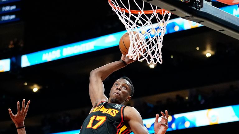 Atlanta Hawks forward Onyeka Okongwu (17) scores in the first half of an NBA basketball game against the Sacramento Kings 