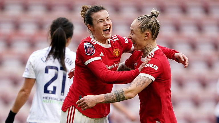 Manchester United's Hayley Ladd (left) celebrates scoring her teams second goal with Leah Galton