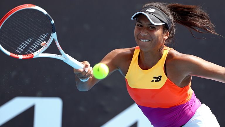 Heather Watson of Britain plays a forehand return to Mayar Sherif of Egypt during their first round match at the Australian Open tennis championships in Melbourne, Australia, Tuesday, Jan. 18, 2022. (AP Photo/Tertius Pickard)