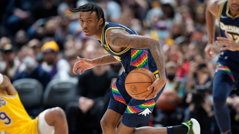 Denver Nuggets guard Bones Hyland picks up a loose ball in the second half of an NBA basketball game against the Los Angeles Lakers Saturday Jan. 15, 2022, in Denver. The Nuggets won 133-96. 