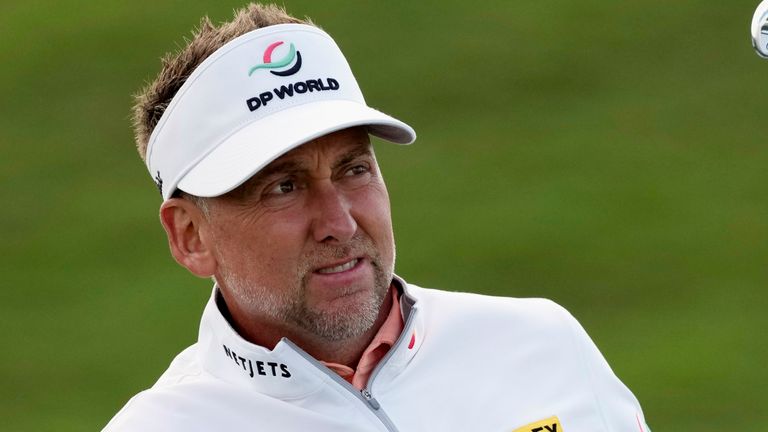 Ian Poulter of England follows his ball on the 18th hole during the second round of the Abu Dhabi Championship golf tournament at the Yas Links Golf Course, in Abu Dhabi, United Arab Emirates, Friday, Jan. 21, 2022. (AP Photo/Kamran Jebreili)
