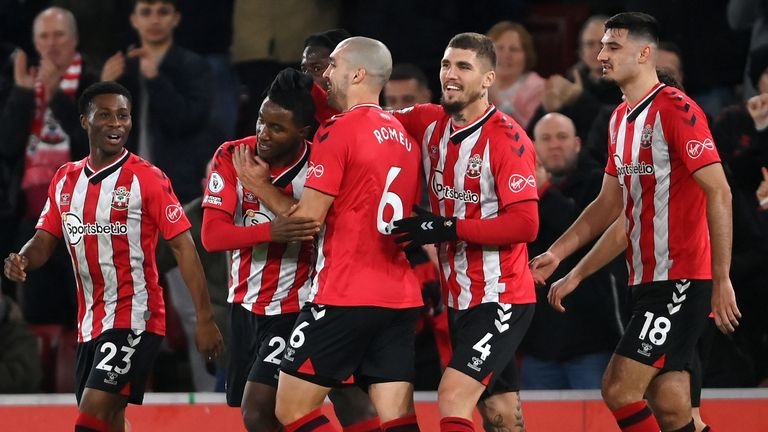 Ibrahima Diallo celebrates with team-mates after Southampton's second goal, an own goal by Brentford's Alvaro Fernandez