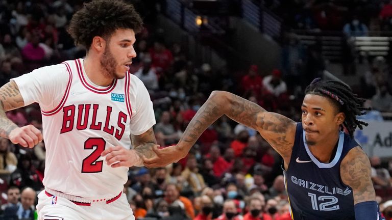 Lonzo Ball of the Chicago Bulls defends Ja Morant of the Memphis Grizzlies (AP)
