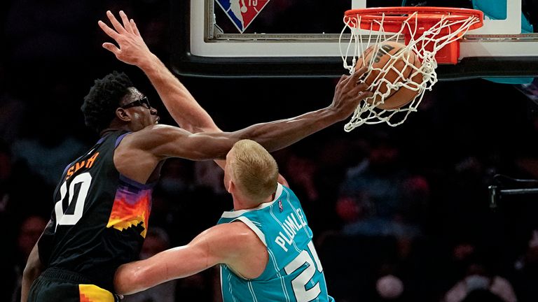 Phoenix Suns forward Jalen Smith dunks over Charlotte Hornets center Mason Plumlee