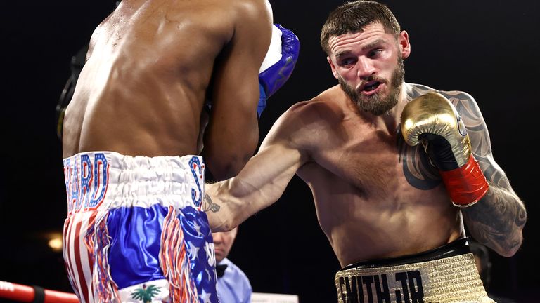 VERONA, NEW YORK - JANUARY 15: Steve Geffrard (L) and Joe Smith Jr (R) exchange punches during their fight for the WBO light heavyweight championship at Turning Stone Resort Casino on January 15, 2022 in Verona, New York. (Photo by Mikey Williams/Top Rank Inc via Getty Images).