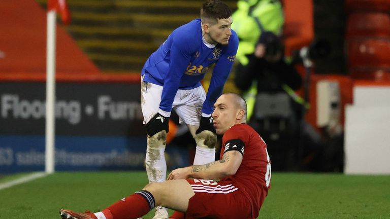 ABERDEEN, SCOTLAND - JANAURY 18: Referee Kevin Clancy sends off Rangers&#39; Ryan Kent for a foul on Aberdeen&#39; Scott Brown  during a Cinch Premiership match between Aberdeen and Rangers at Pittodrie, on January 18, 2022, in Aberdeen, Scotland. (Photo by Craig Williamson / SNS Group)