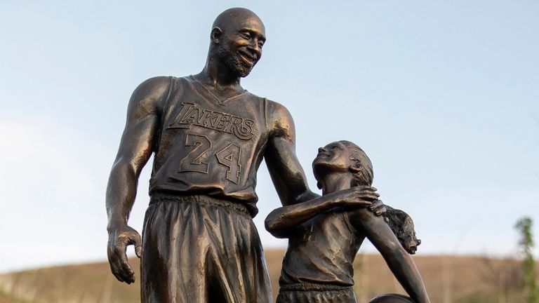 Sculpture of Bryant and daughter placed at crash site thumbnail